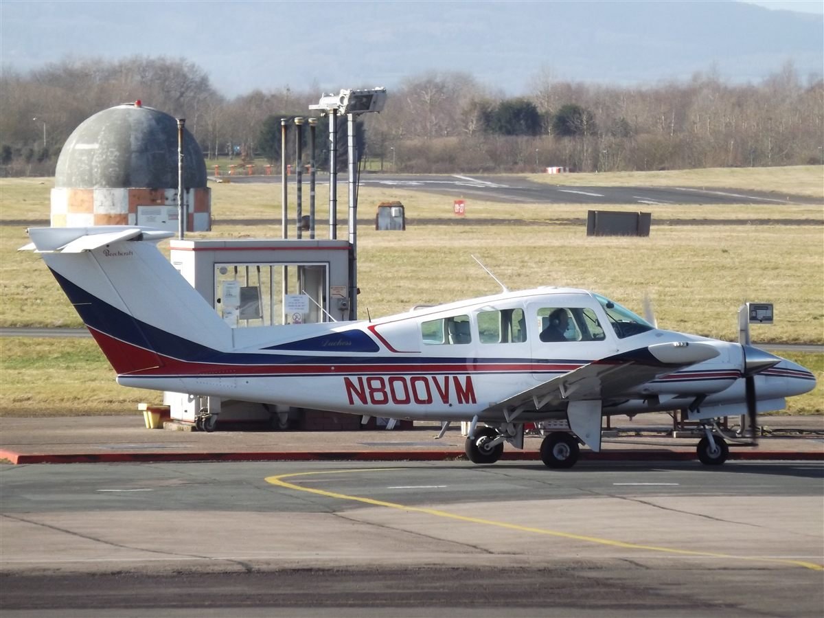Beechcraft Duchess N800VM showing its T-tail on the ramp