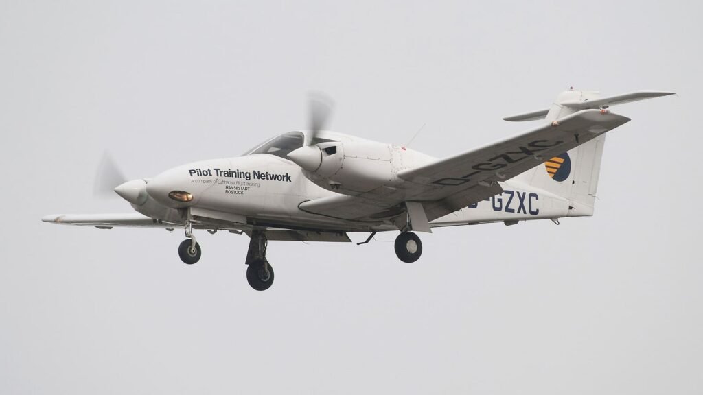 Piper PA-44 Seminole multi-engine training aircraft on approach