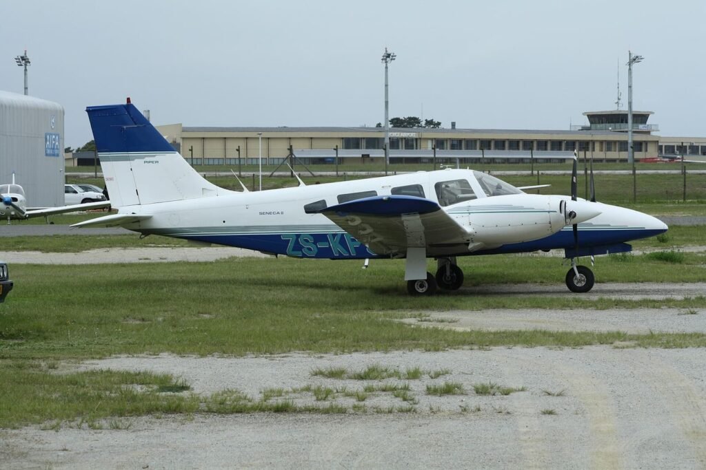 Piper Seneca II turbocharged twin parked on the ramp